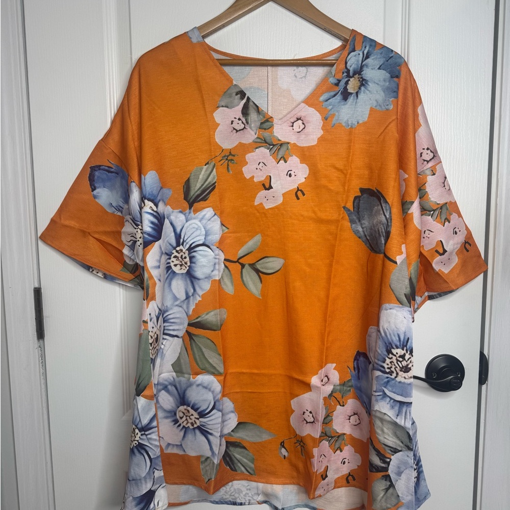 New! In packaging Orange Floral Tunic top